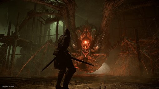 Игроки обнаружили загадочную дверь в Demon's Souls. Никто не знает, как ее открыть
